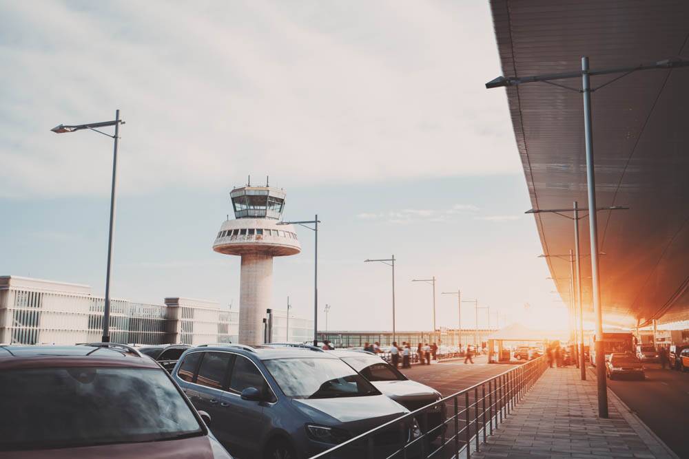 Save on airport parking fees by letting someone else use your car while you're away.