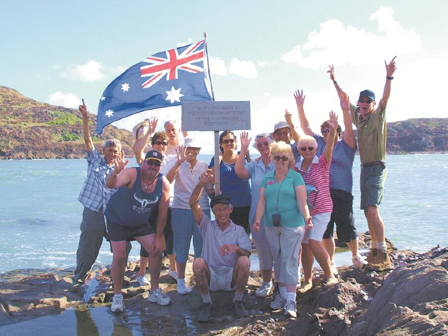 MADE IT – Visitors at the tip of Cape York, the northernmost point of mainland Australia.