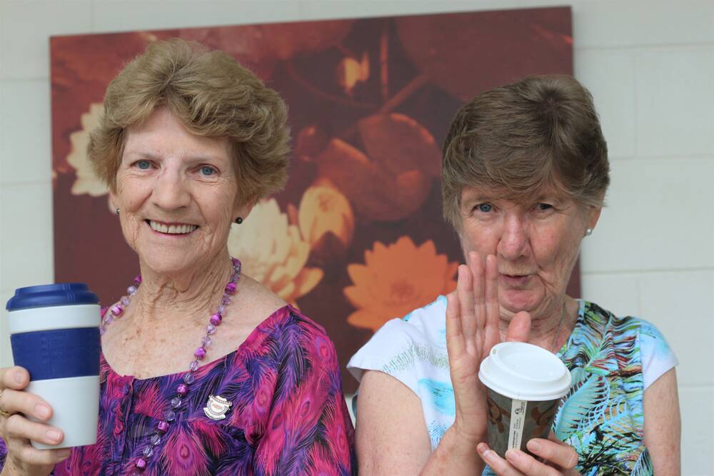 CLEANER WORLD – Cherith Weis (left) is happy with her reusable mug while assistant state secretary Nola Harvey (right) doesn’t like her coffee cup being a polluter.