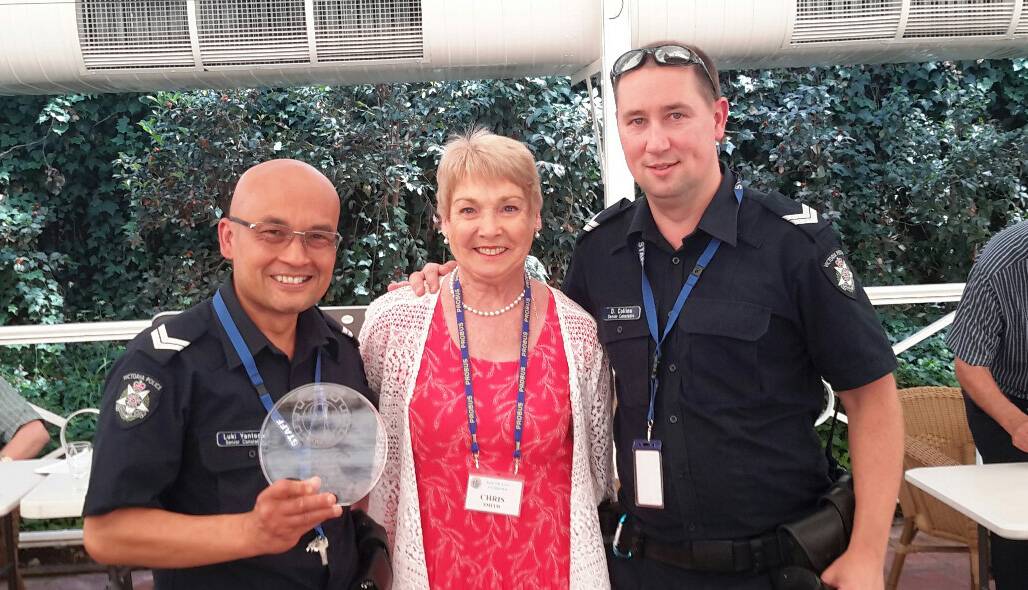Scam savvy – Senior Constables Luki Yantono (left) and Damien Collins with Christine Smith from the East Keilor Combined Probus Club.