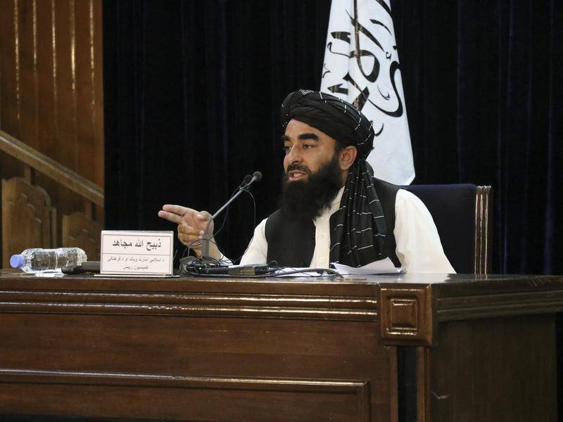 Taliban spokesman Zabihullah Mujahid says "no Afghan supports" the Islamic State group.
