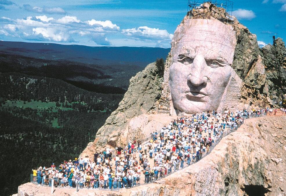 UP YOU GO –  The annual  stampede to the Crazy Horse Memorial.