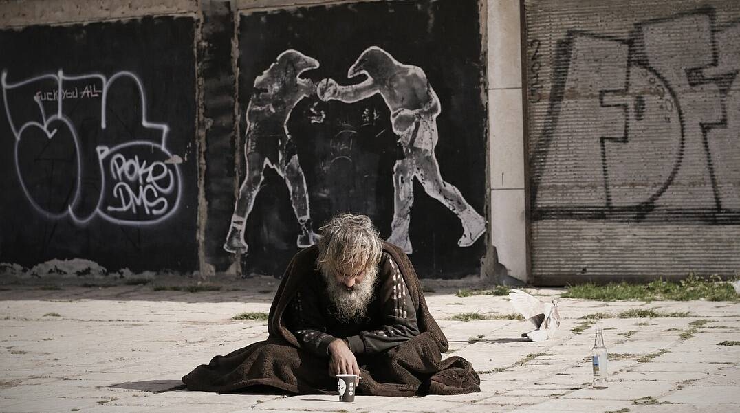 A homeless man sleeping rough in the city. More and more older people will be homeless on current trends.