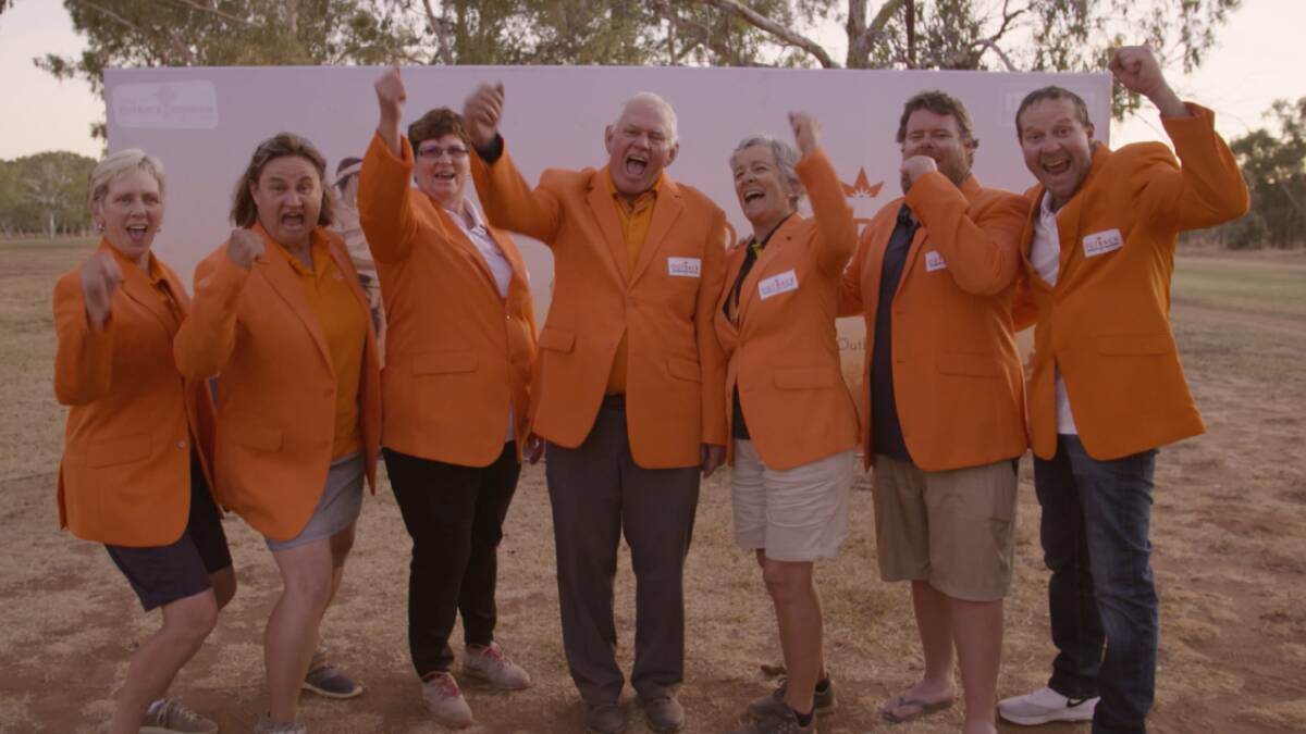 Robert and Kerrie Rule (fourth and fifth from left) celebrate being crowned Outback Queensland Masters Series champions in 2019. Image: Pixelframe.
