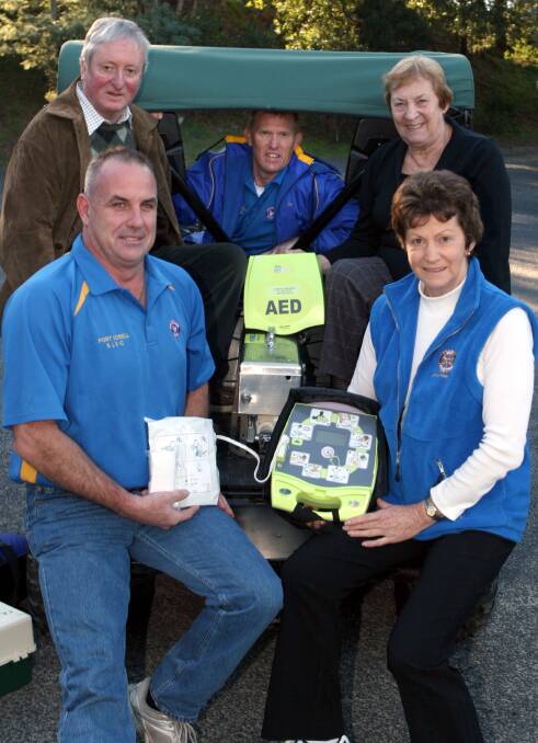 Port Sorell Surf Life Saving Club members with a new defibrillator donated by the Rotary Club of Latrobe. ACM file picture