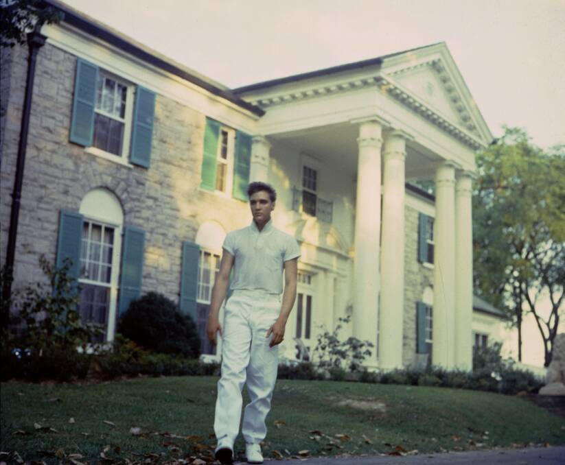 GRACELAND: Elvis strolls the grounds of his beloved estate.